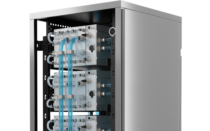 Server rack with blue cables and modular panels inside a data center cabinet, viewed from the side